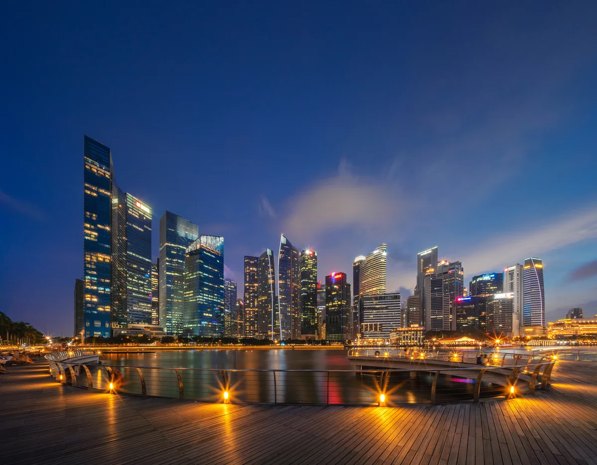 Singapore's Marina Bay skyline illuminated at dusk